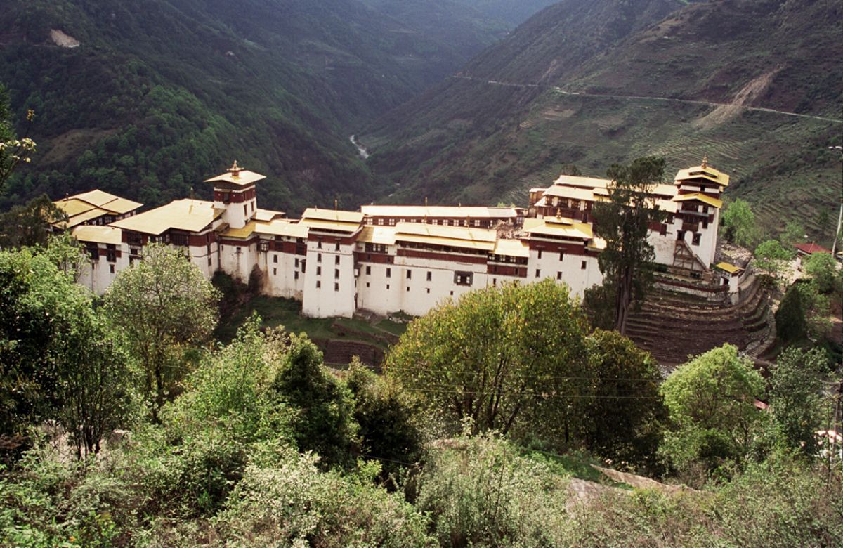 A Bhutanese dzong standing on a ridge