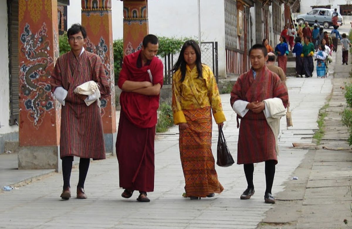 Bhutanese men and women in gho and kira