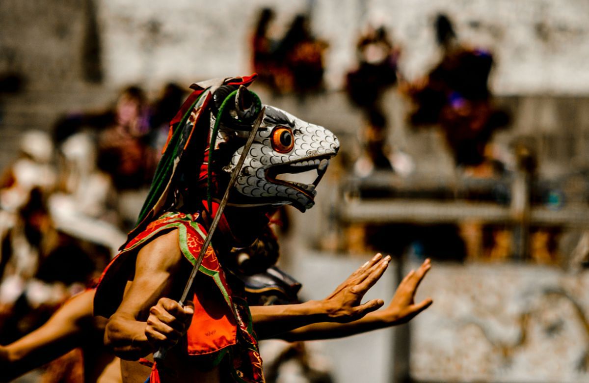 Cham dancers in motion at a Bhutanese festival