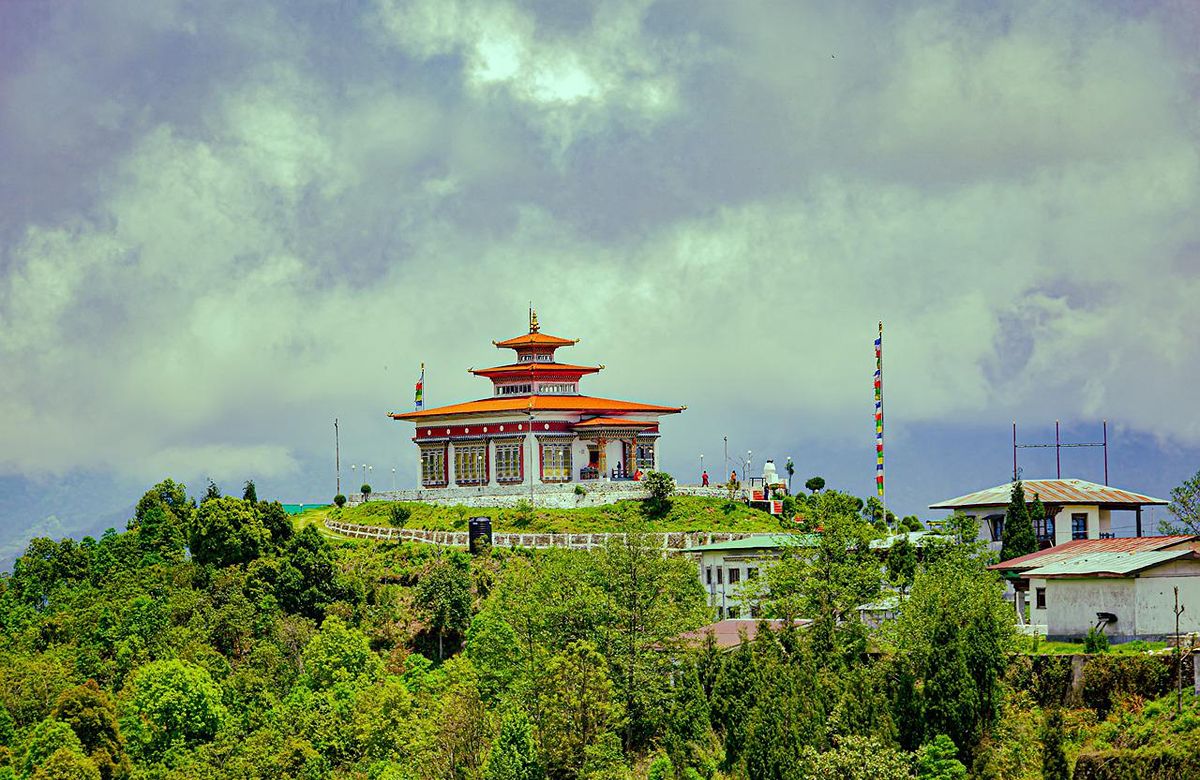 A hilltop monastery looking out over a Bhutanese valley