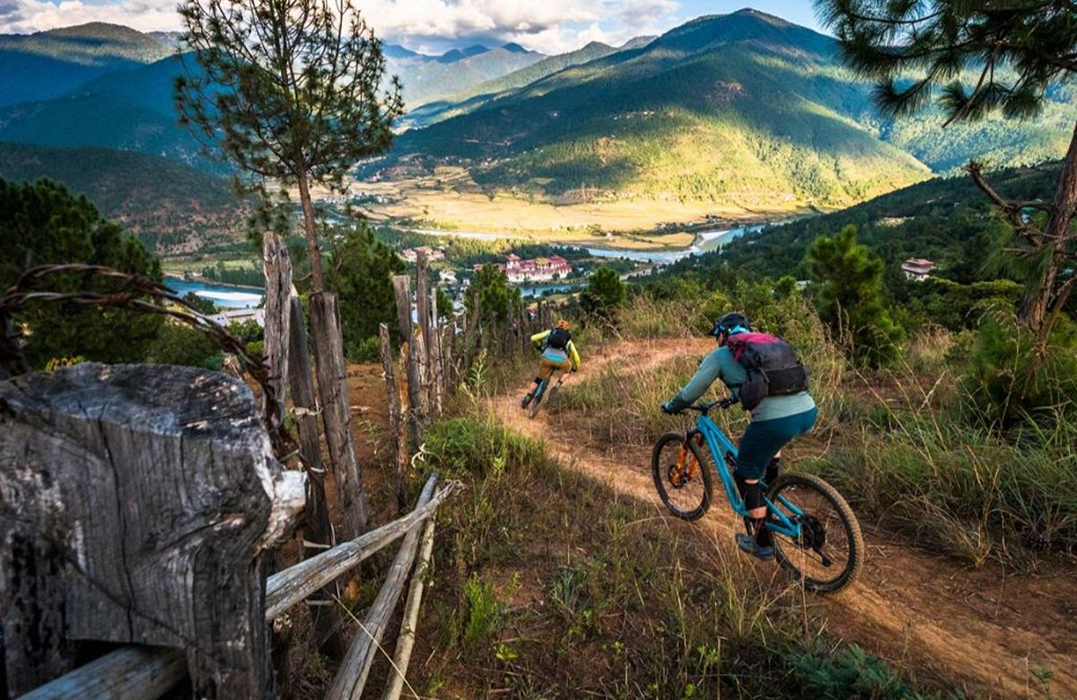 A mountain biker on a forest trail in Bhutan