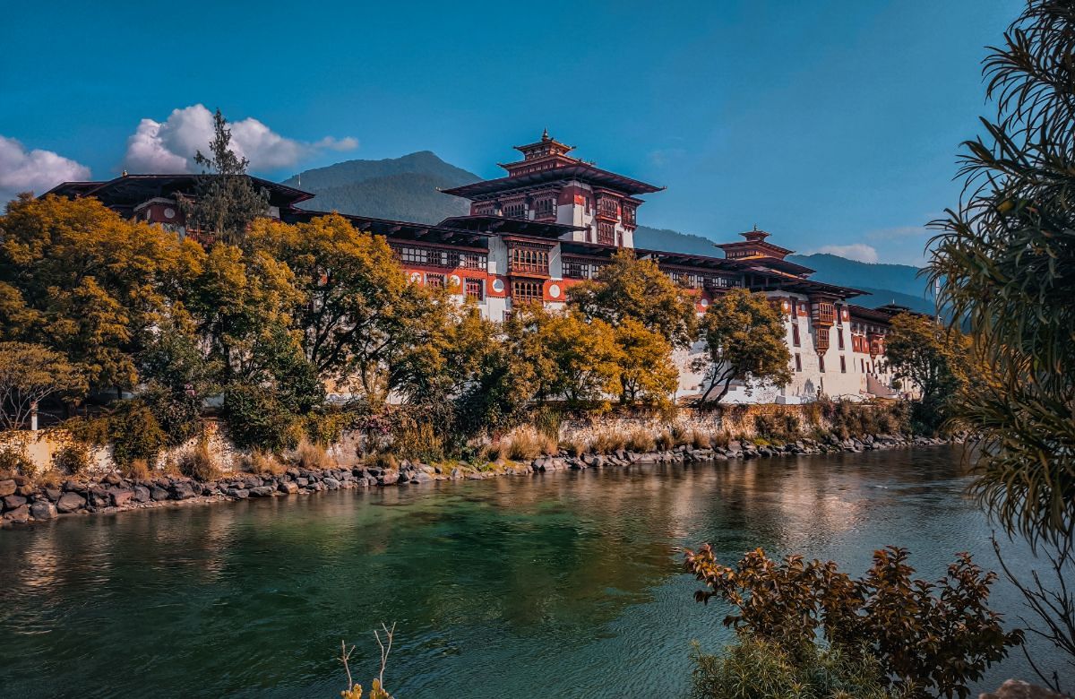 Punakha Dzong in autumn light beside the river